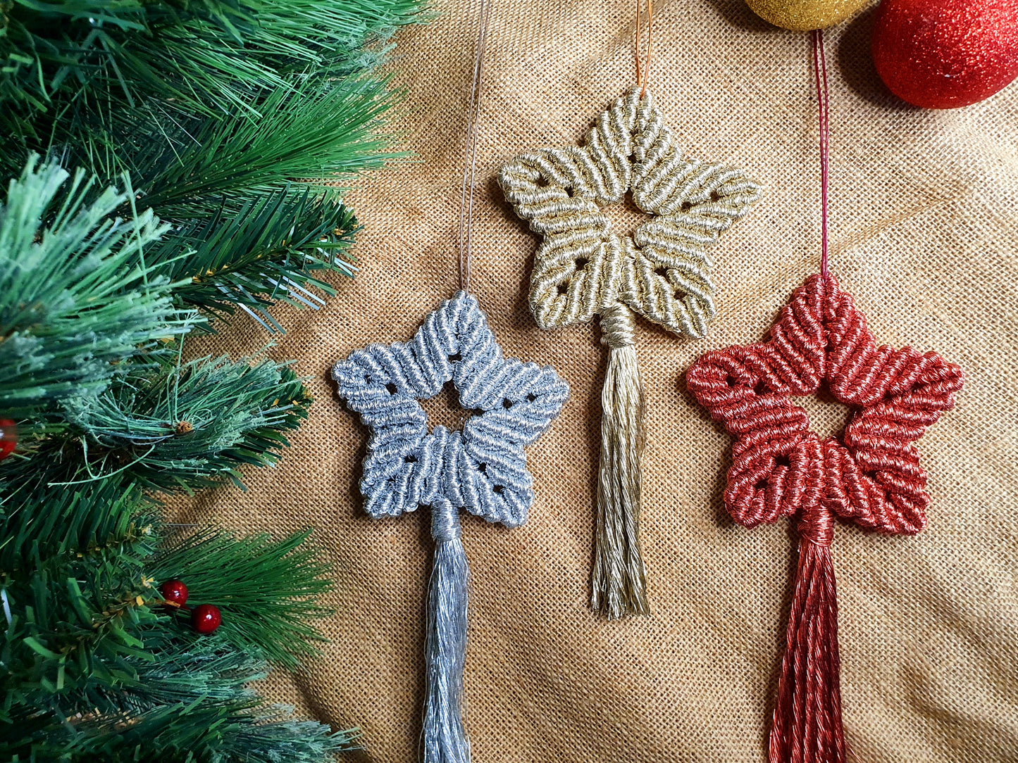 Shiny boho macrame star Christmas hanging baubles, gold silver red Christmas star tree hangings, festive decor, holiday decorations, stars