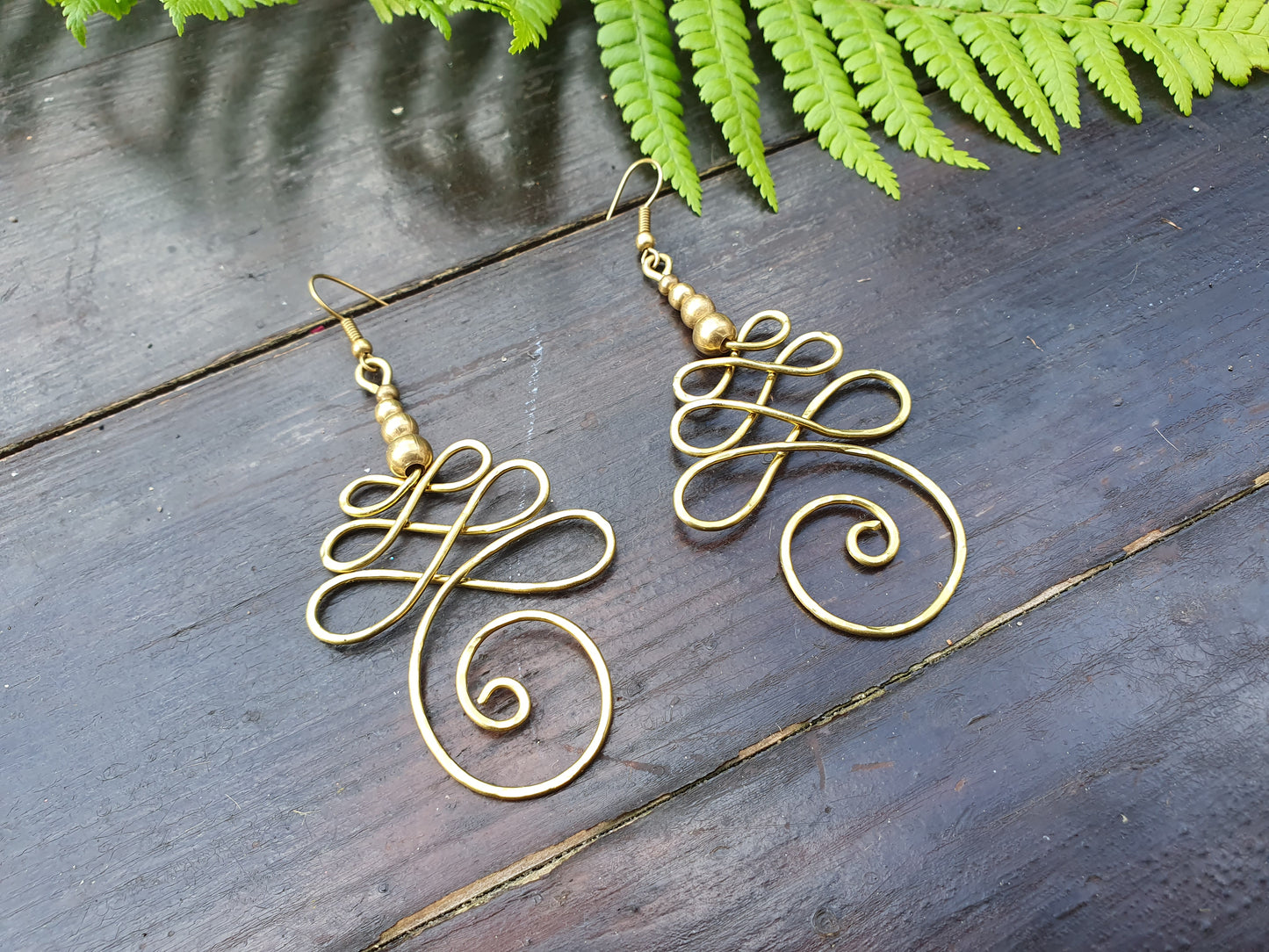 Gold UNALOME earrings, hammered wire buddhist symbol of life journey meaningful mindful spiritual jewellery, boho tribal feminist wire art